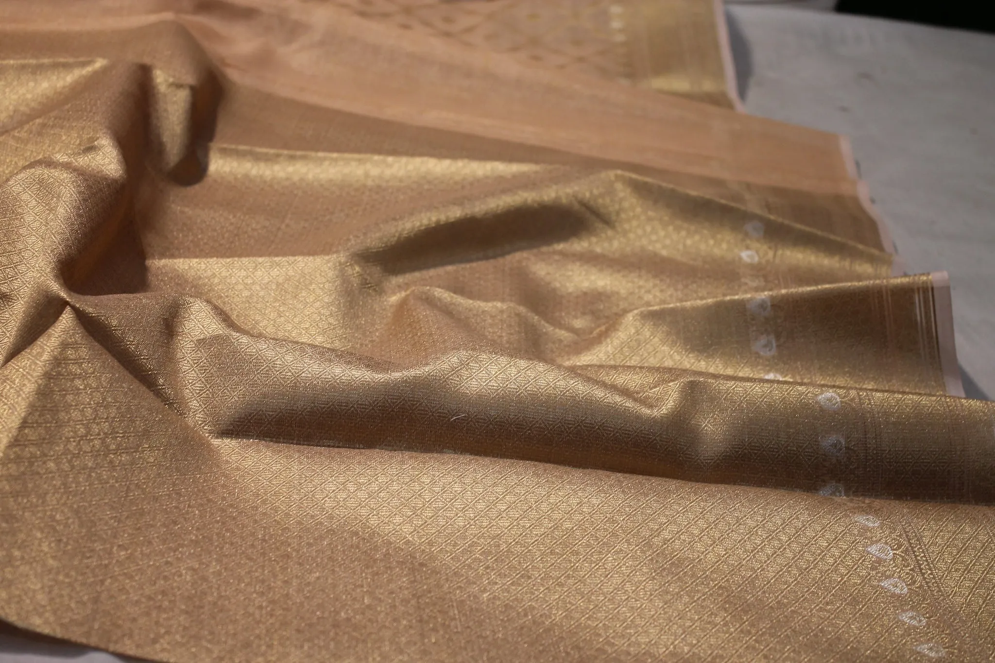 Luxurious Peach Pure Tissue Silk Saree
